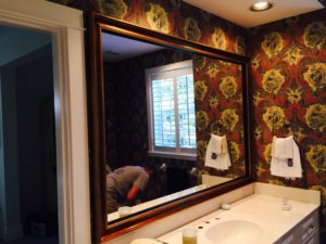 mirror with decorative frame applied