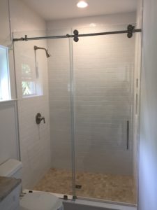 barn door sliding glass shower enclosure